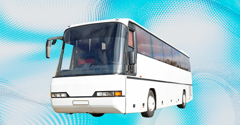 A white bus against a blue background.